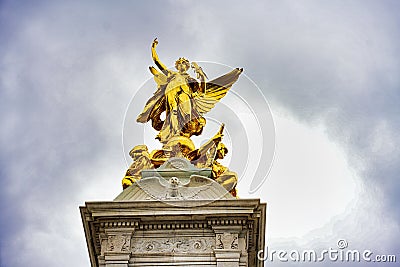 Low angle shot of Queen Victoria Memorial.Golden monument winged statue angel near Buckingham Palace Stock Photo