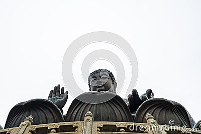Low angle shot of the statue of Tian Tan Buddha in Lantau, Hong Kong under a clear sky Stock Photo