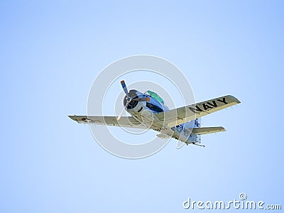 Low angle shot of a stunt jet flying in the sky for the Wings Over Indy Air Show Editorial Stock Photo