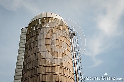 Low angle shot of a tall water tower at a farm Stock Photo