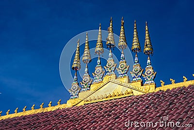 Low-angle shot of a temple roof design in Wat Phiawat, Xiangkhouang, Laos Stock Photo