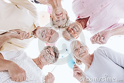 Low angle of smiling seniors Stock Photo