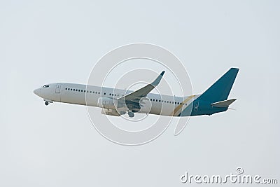 Low angle view of aeroplane with cloudy sky Stock Photo