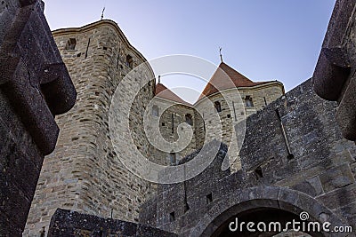 Low-angle view of the Carcassonne medieval fortified city tower in southern France on a sunny day Editorial Stock Photo