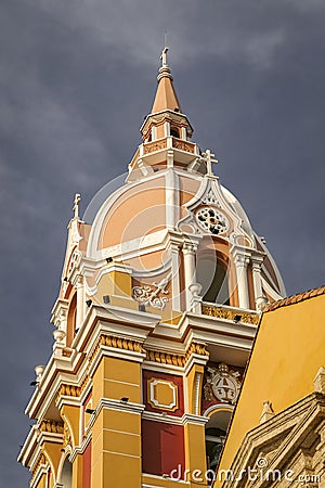 The dome of Cartagena cathedral in sunlight against dark sky, Old Town Cartagena, Colombia Stock Photo