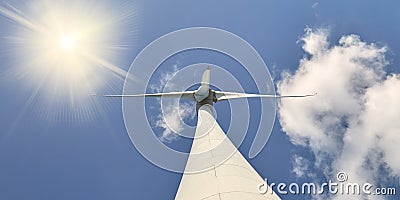 Dutch wind turbine with blue sky and sunlight Stock Photo
