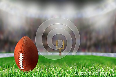 Football on Grass Ready For Field Goal or Kick Off Stock Photo