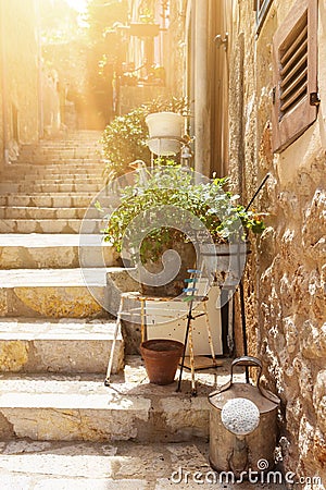 Narow steep staircase alley in small mediterranean village Stock Photo