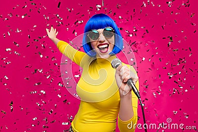 Low angle view photo of nice lady singer night club party hold microphone karaoke sound confetti fall wear specs yellow Stock Photo