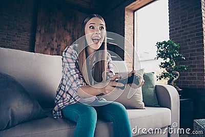 Low angle view photo portrait of cheerful ecstatic excited enthusiastic she her hipster teen girl using holding Stock Photo