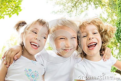 Low angle view portrait of happy children Stock Photo