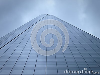 Low angle view of the Shard against cloudy sky. Editorial Stock Photo