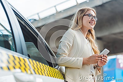 low angle view of smiling blonde girl Stock Photo