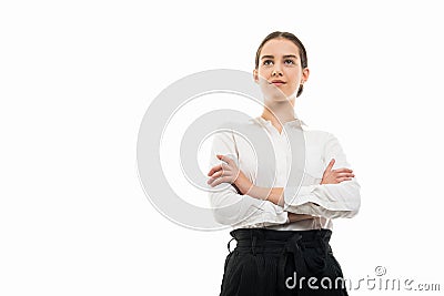 Low angle of young bussines woman standing with arms crossed Stock Photo