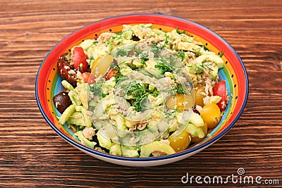 Low carbs Tuna Avocado Salad in glass bowl. Stock Photo