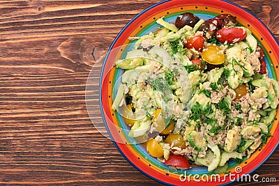 Low carbs Tuna Avocado Salad in glass bowl. Stock Photo