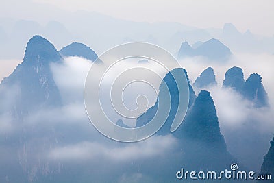 Low covering cloud over karst Mountain, Yangshuo China Stock Photo