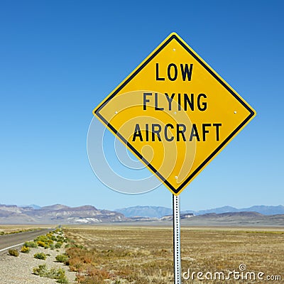 Low flying aircraft sign on side of highway. Stock Photo