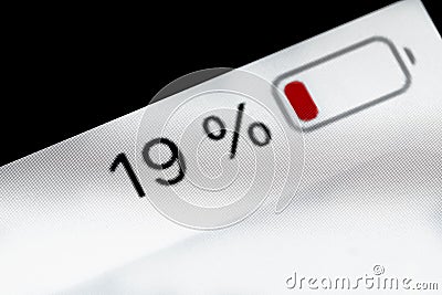 Smartphone battery level indicator - nineteen, 19 percent: close up macro Stock Photo
