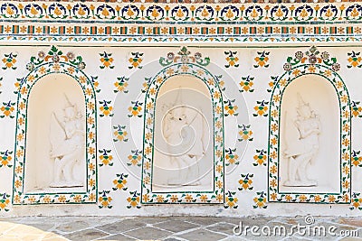 Low relief statue of half-bird half-woman on the wall a Wat Arun Bangkok. Stock Photo