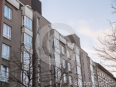 Low Rise Apartment Building with Bare Trees Stock Photo