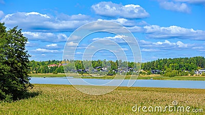 Low-rise residential houses on shore of Baltic sea strait in Kaarina, Finland at sunny summer day Stock Photo