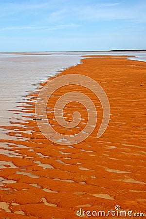 A low tide on a sandy beach Stock Photo