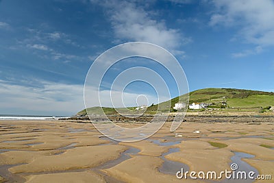 Low tide on beach at Croyde, North Devon Stock Photo