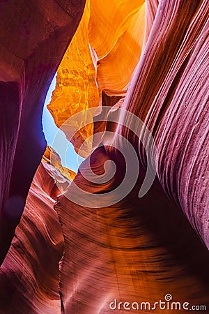 Lower Antelope Canyon`s Wave-curved rock maze with changing light and shadow. Stock Photo