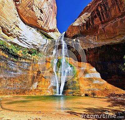 Lower Calf Creek Falls Waterfall colorful views from the hiking trail Grand Staircase Escalante National Monument between Boulder Stock Photo