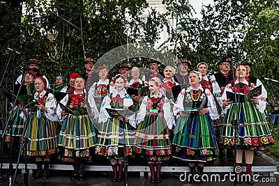 Folk musicians, music band dressed in polish national folk costumes from Lowicz Editorial Stock Photo