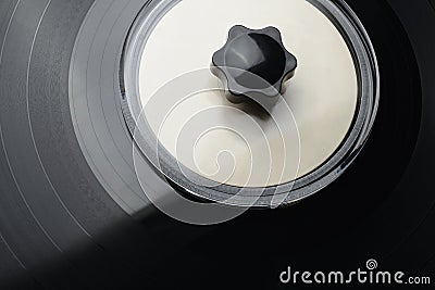 LP vinyl record disk with plastic cleaning or washing clamp Stock Photo