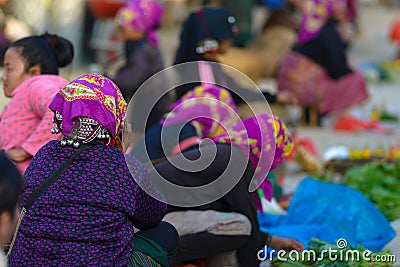 Luang Namtha, Laos - circa november, 2019: portrait adult Akha woman at market wearing traditional clothings belonging to minority Editorial Stock Photo