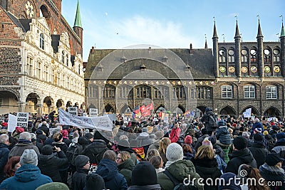 Lubeck, Germany, January 22, 2024: Large crowd of people at the demonstration on the market at the town hall of Lubeck, protest Editorial Stock Photo