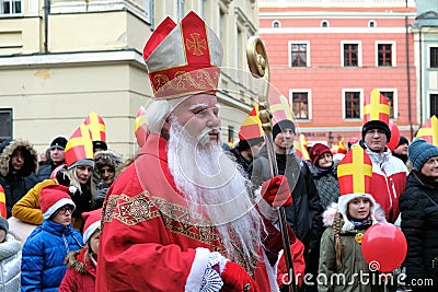 Saint Nicholas Santa Claus during a celebration of St Nicholas nameday called Orszak swietego mikolaja `Saint Nicholas Editorial Stock Photo