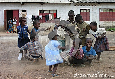 Lubumbashi, Democratic Republic of Congo: Group of children playing Editorial Stock Photo