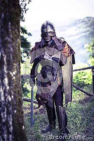 Lucca, Italy - 2018 10 31 : Uruk-hai warrior with helmet and sword from the lord of the rings Editorial Stock Photo