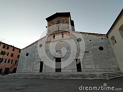 Lucca, Italy, view of the Basilica of San Frediano in the evening. Editorial Stock Photo