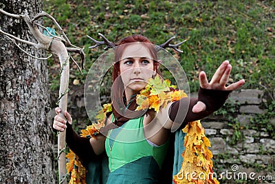 Cosplayer girl dressed as a forest fairy. Lucca Comics and Games 2023 cosplay event. Editorial Stock Photo