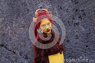 Cosplayer girl dressed as Hormone Monstress, character from the animated series Big Mouth. Editorial Stock Photo