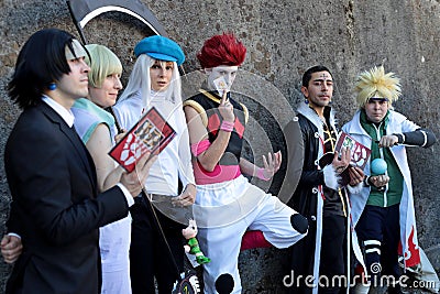 Group of cosplayers dressed as characters from the manga Hunter x Hunter and Naruto at the Lucca Comics and Games 2022. Editorial Stock Photo