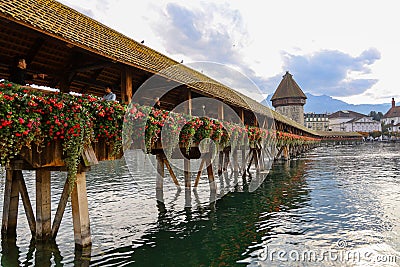 Lucerne, Switzerland-October 18,2019:The old wood Chapel Bridge is famous and beautiful landmark in Lucerne, Switzerland Editorial Stock Photo