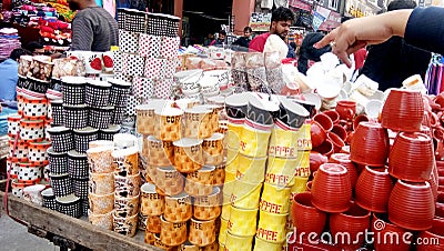 Variety of tea and coffee mugs for sale in asian market Editorial Stock Photo