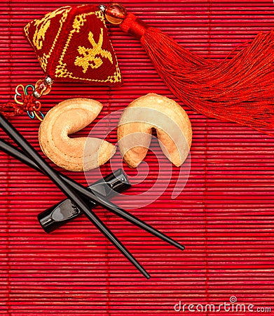 Lucky charm, fortune cookies and chopsticks. Chinese new year Stock Photo