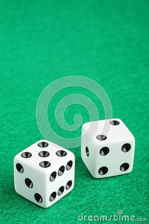 Lucky seven dice on gambling table Stock Photo