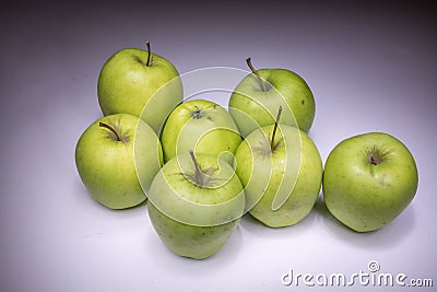 Lucky seven green apples Stock Photo