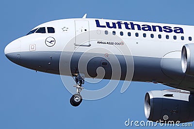 Lufthansa plane flying up in the sky, close-up view Editorial Stock Photo