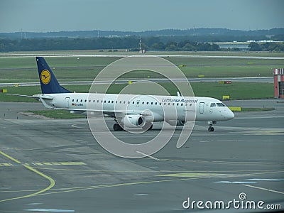 Lufthansa Embraer ERJ-195LR taxiing in Prague Editorial Stock Photo