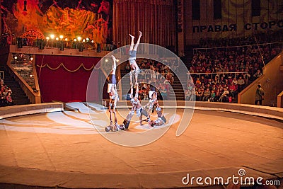 LUGANSK ,UKRAINE - APRIL 9, 2016: several acrobats in a circus act Editorial Stock Photo