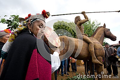 Mapuche machi performing a traditional prayer Editorial Stock Photo